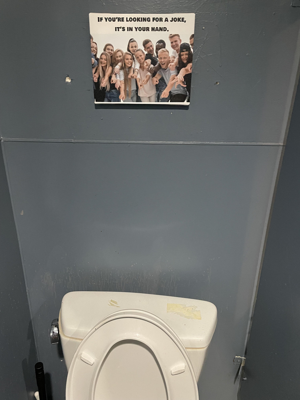 This sign in the mens bathroom