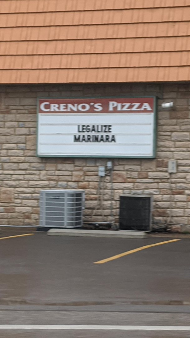 This sign on a local pizza shop