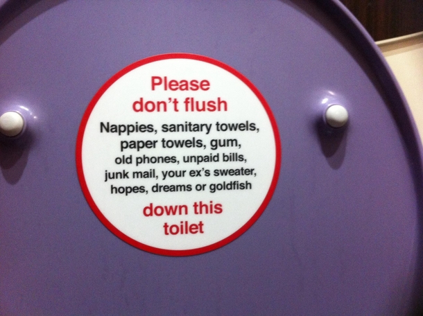 This sign on a public toilet