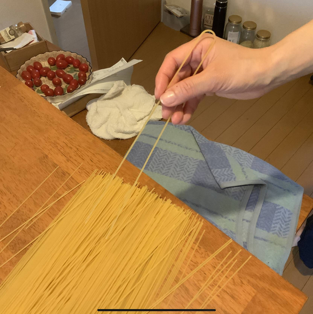This spaghetti comes with chopstick spaghetti to eat the spaghetti