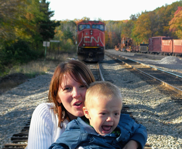 This was supposed to be a cute photo op of my wife and son at the train yard