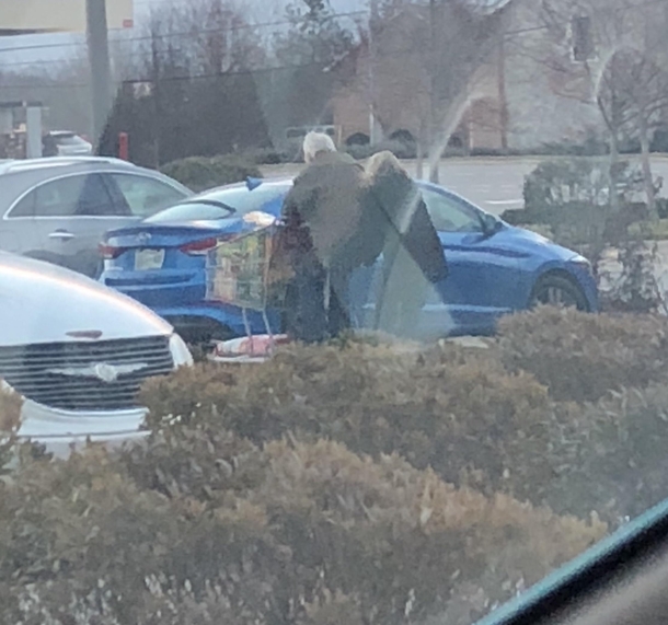 This woman was pushing her older husband on Costco cart just for fun and gave us a thumbs up as they passed