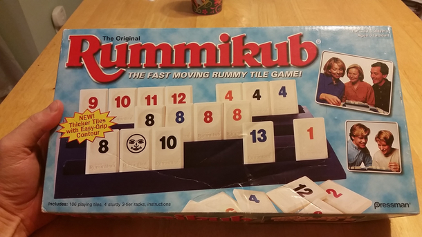 Three of the five people on this box are cheating at the game