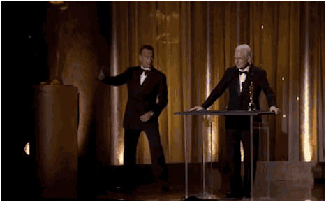 Tom Hanks sneaking a selfie with Steve Martin