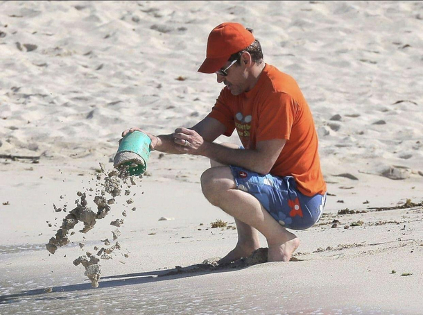 Tony Stark playing with Peter Parker