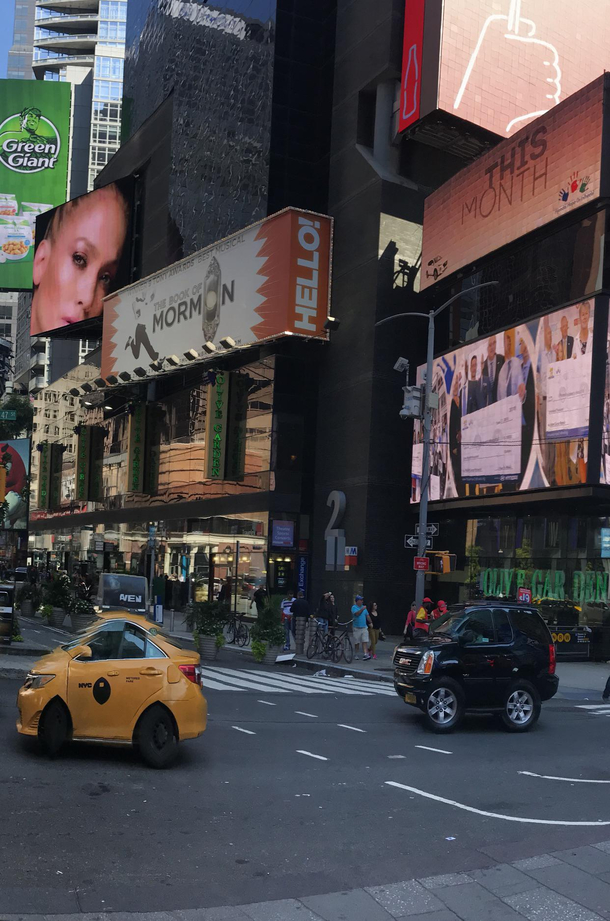 Took a panorama picture on Times Square and it shrunk the cars