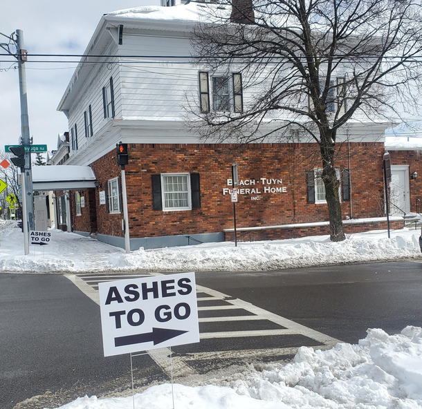 Took me a minute to realize the signs were actually for the nearby church