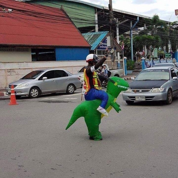 Traffic police officer in front of a primary school