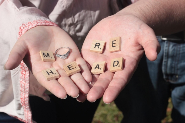 Tried taking a cute engagement photo but my future last name didnt work very well