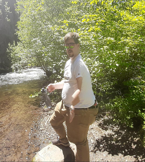 Tried to take a panorama from our hike today it really did my boyfriend dirty