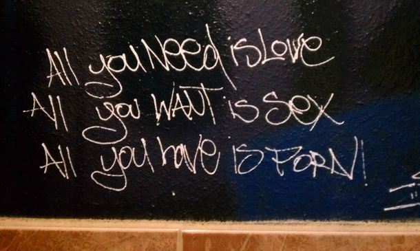 Truth on a bathroom wall