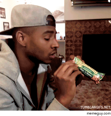Trying to eat a Nature Valley bar