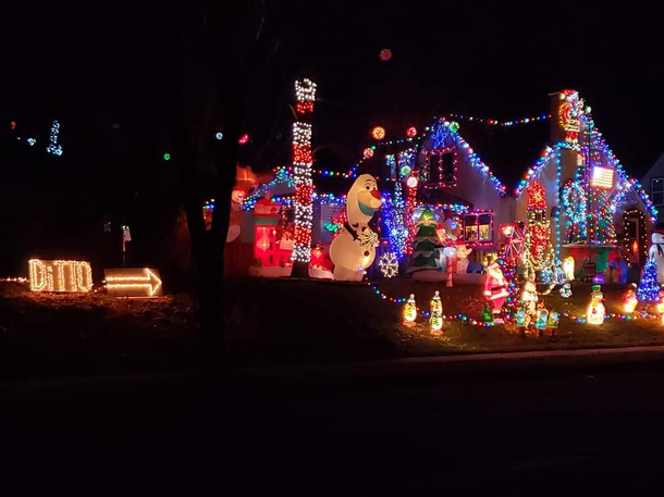 two of my neighbors christmas lights