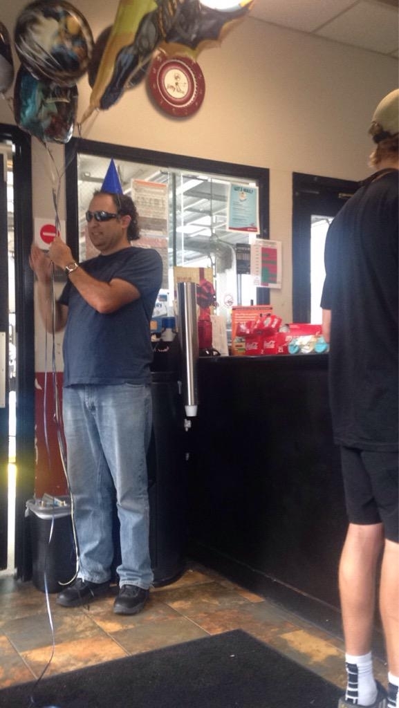 Waiting at Jiffy Lube and this guy brought cookies hats balloons and soda for everyone so that we could have a party while we waited