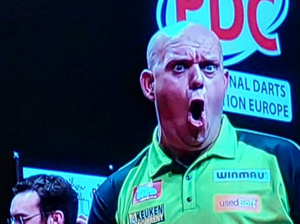 Was watching a dart match Couldnt resist capturing his explosive excitement when he registered a great shot