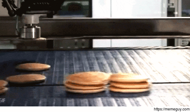 Watch this mesmerizing machine that can sort and stack  pancakes per hour