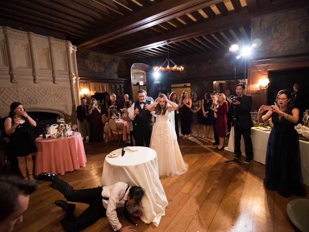 We pranked our wedding guests by having the best man and brides brother drop the replica wedding cake as it was brought out for us to slice