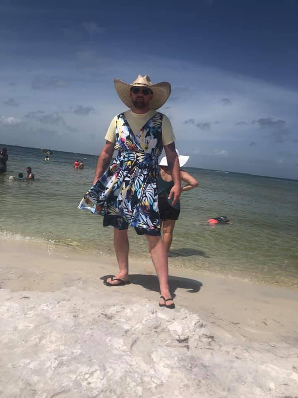 We take turns wearing this dress in various public places I wore it fishing at a relatively empty park area He has upped the game by wearing it to a beach in Florida I am dreading my next turn