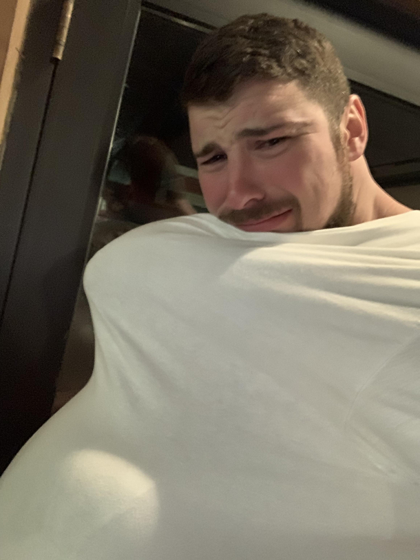We were drunk and cold and my boyfriend put me inside of his shirt I found this picture this morning