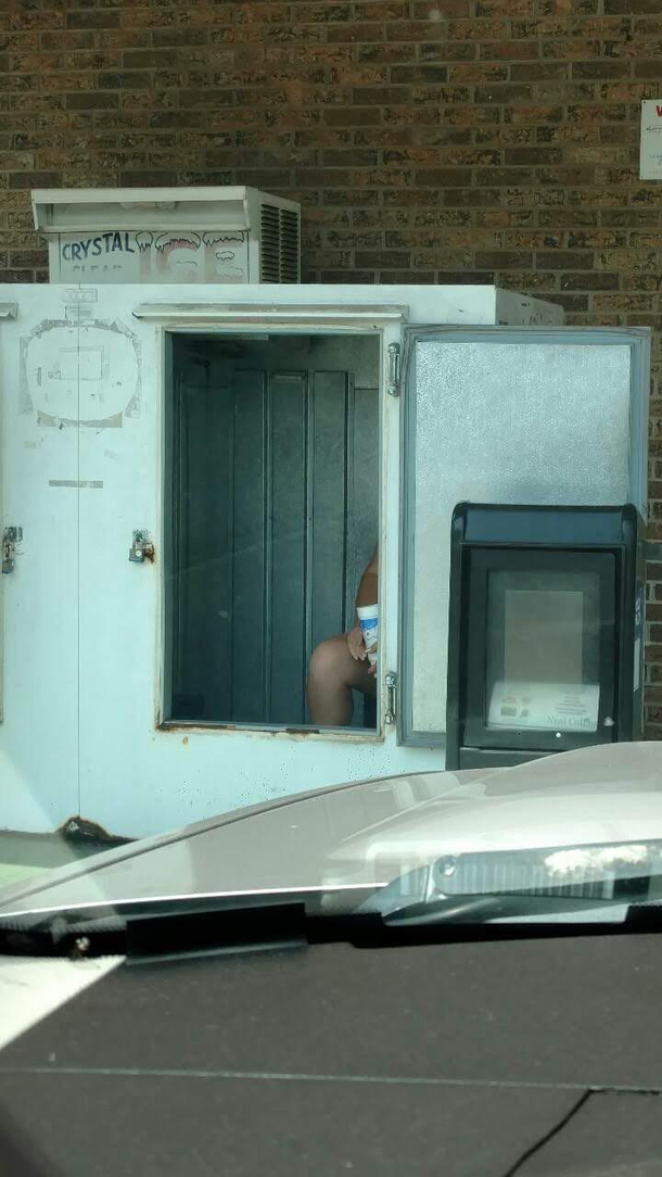 Well I guess sitting in a gas station ice cooler is a way to beat the heat Things you see