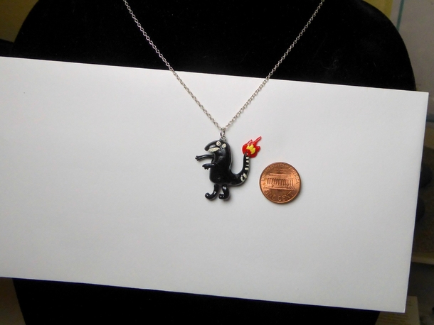 Well I sculpted that guys shitty Charmander tattoo into a necklace and I know EXACTLY why Because Im a filthy procrastinator thats why