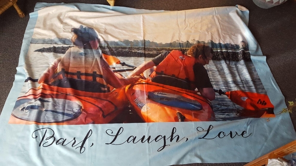Went on a beach vacation Dad thought he was capturing a tender moment Boyfriend just asked me to hold onto his boat while he puked Naturally I blew it up and put it on a blanket
