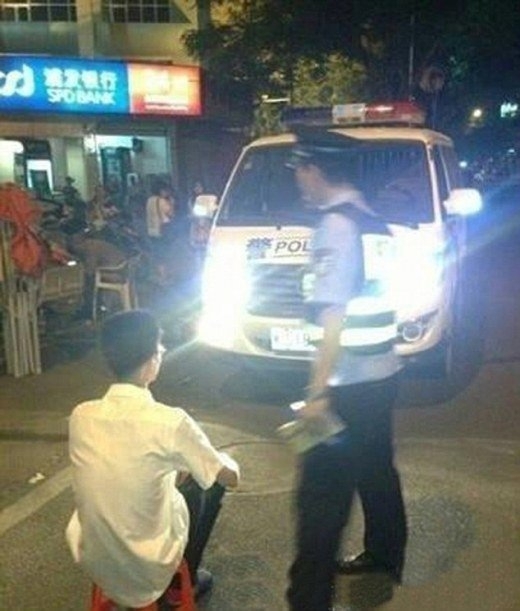 What cops do to you in China if you drive around with high beam