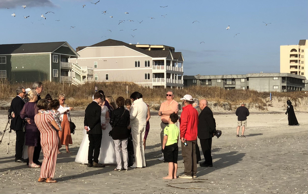 Whats a beach wedding without Elvis officiating and Darth Vader crashing the party