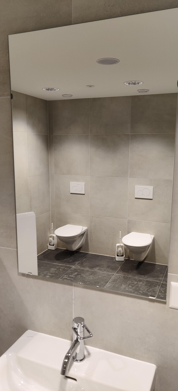 Whats better than washing your hands while being able to make eye contact with the  people taking a shit next to each other