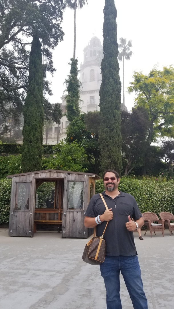 When you ask someone for a picture at Hearst Castle while forgetting youre holding your wifes purse