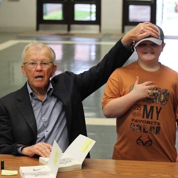 When you show up to a Coach Joe Gibbs autograph signing wearing the wrong teams hat