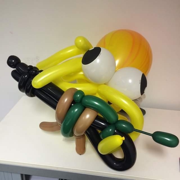 When your company brings in a dude that makes balloon animals and you ask for an octopus with a machine gun