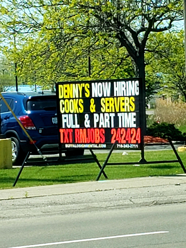 While I was driving at work the other day I got stopped at a light and this hiring sign in front of Dennys caught my eye