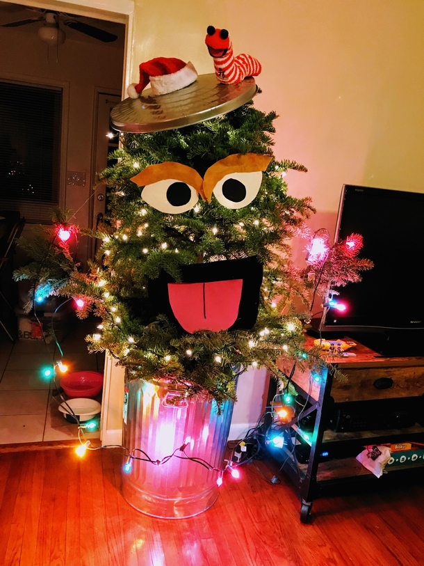 While shopping for a tree this year my husband and I spotted an ugly misfit - oval shaped flat on the top with a huge gap in the middle Most were deterred but we e were instantly inspired Meet Oscarmas and Slimy