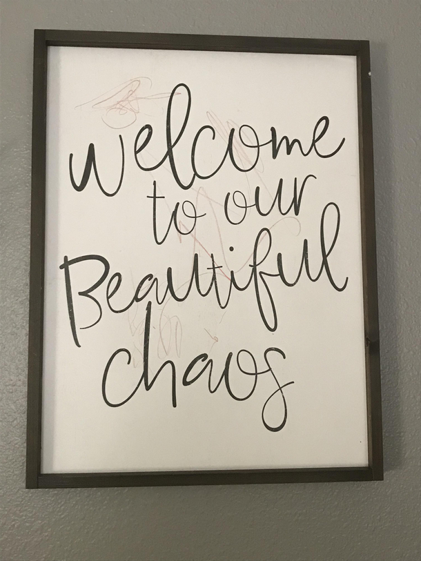 Wife brought this home today and was excited to hang it on the wall  minutes later my  and  yr old took a red crayon to it while we were cooking dinner We think it is perfectly ironic