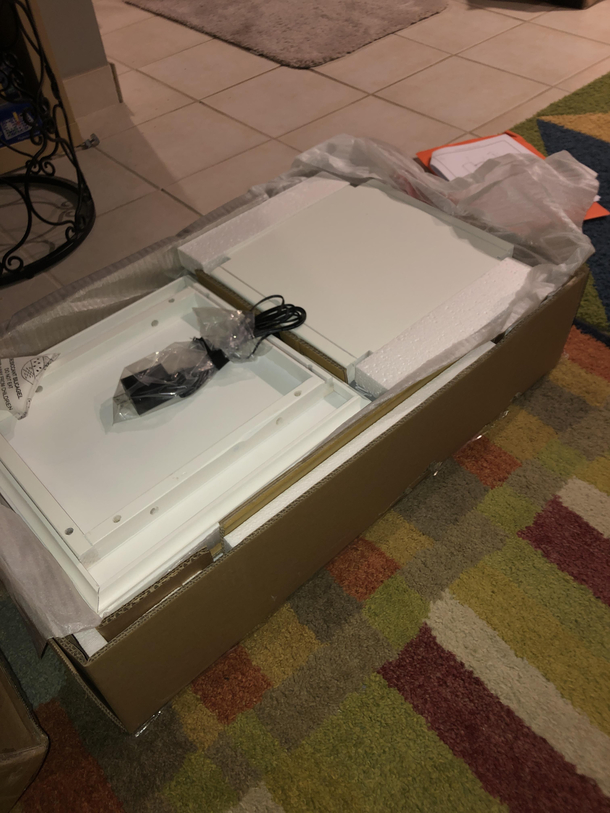 Wife wakes me up at  am to tell me not to forget to put together our son s present