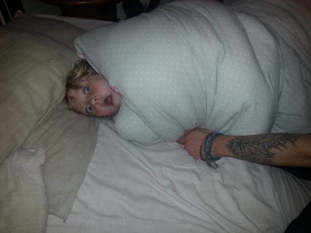 Wrapped my sister up like a cocoon this was her face when she realised she couldnt get out