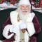 Pic #2 - So I brought my Guinea pig to get his picture taken with Santa then he ran up Santas jacket