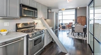  million San Francisco loft has diagonal support beam that cuts through the middle of the kitchen