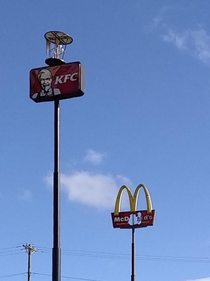 A big storm came through my region and hurled the KFC bucket at McDonalds Golden Arches Thats a lot of damage