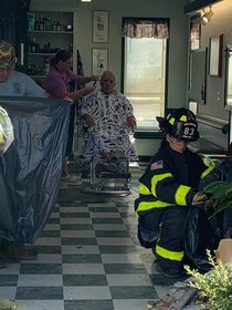 A car drove through the front of a barber shop in Delaware US This man wasnt about to let that get in the way of his fresh cut