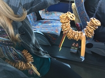 A girl on our winerybrewery party bus made homemade pretzel cheese and jerky necklaces for everyone