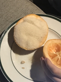 A grapefruit my brother put a little sugar on