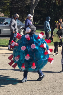 A kid dressed up as Coronavirus for Halloween