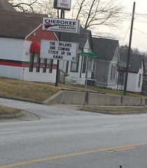 A marquee at a local gun shop Ya gotta do what ya gotta do