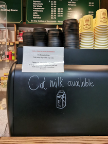 A regular at work keeps changing our Oat Milk sign