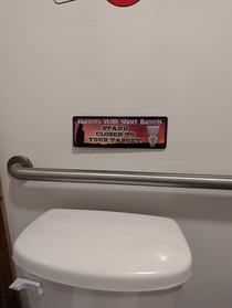 a sign above the Toilet at a local donut shop in Lafayette Louisiana