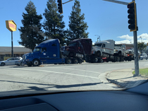 A tow truck conga line