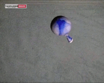 A water balloon full of mercury hitting the ground