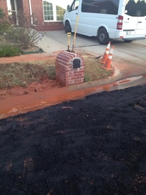 A water line busted on my street and caused my neighbors mail box to sink into the ground